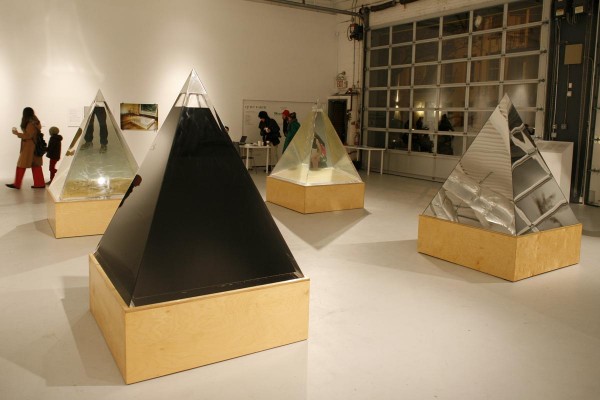 Agnes Denes. Pyramids of Conscience, 2005. Crude oil, tap water (City of New York), polluted water (New York harbor), the mirror, in which you see yourself make decisions about water for humanity.